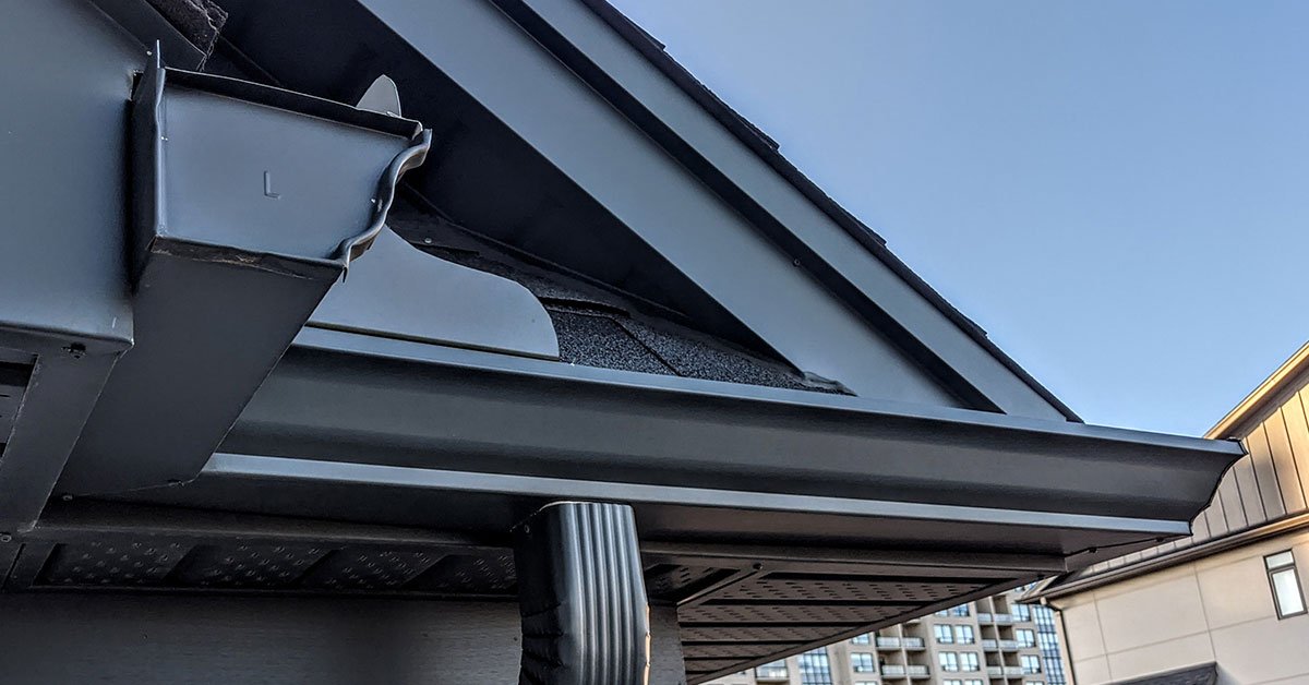 Seamless aluminum gutter and downspout installation in St. Louis by Meridian Roofing