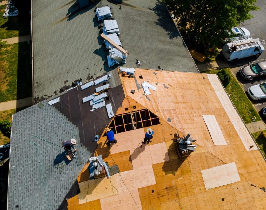Efficient crew at work during roof replacement near me in Sunset Hills, MO