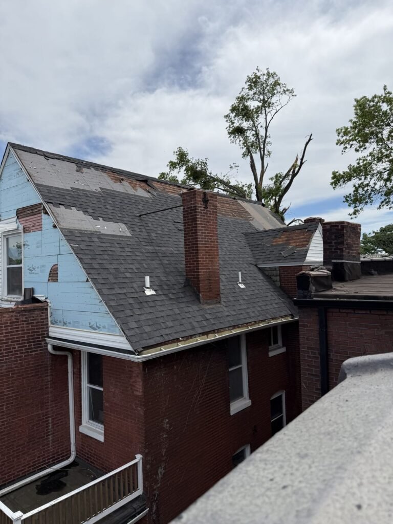 Full residential roof inspection showing aging shingles in St. Louis MO