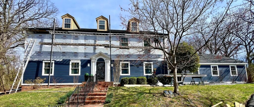 Blue James Hardie colonial siding full house installed by Meridian Roofing St. Louis