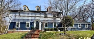 Blue James Hardie colonial siding full house installed by Meridian Roofing St. Louis