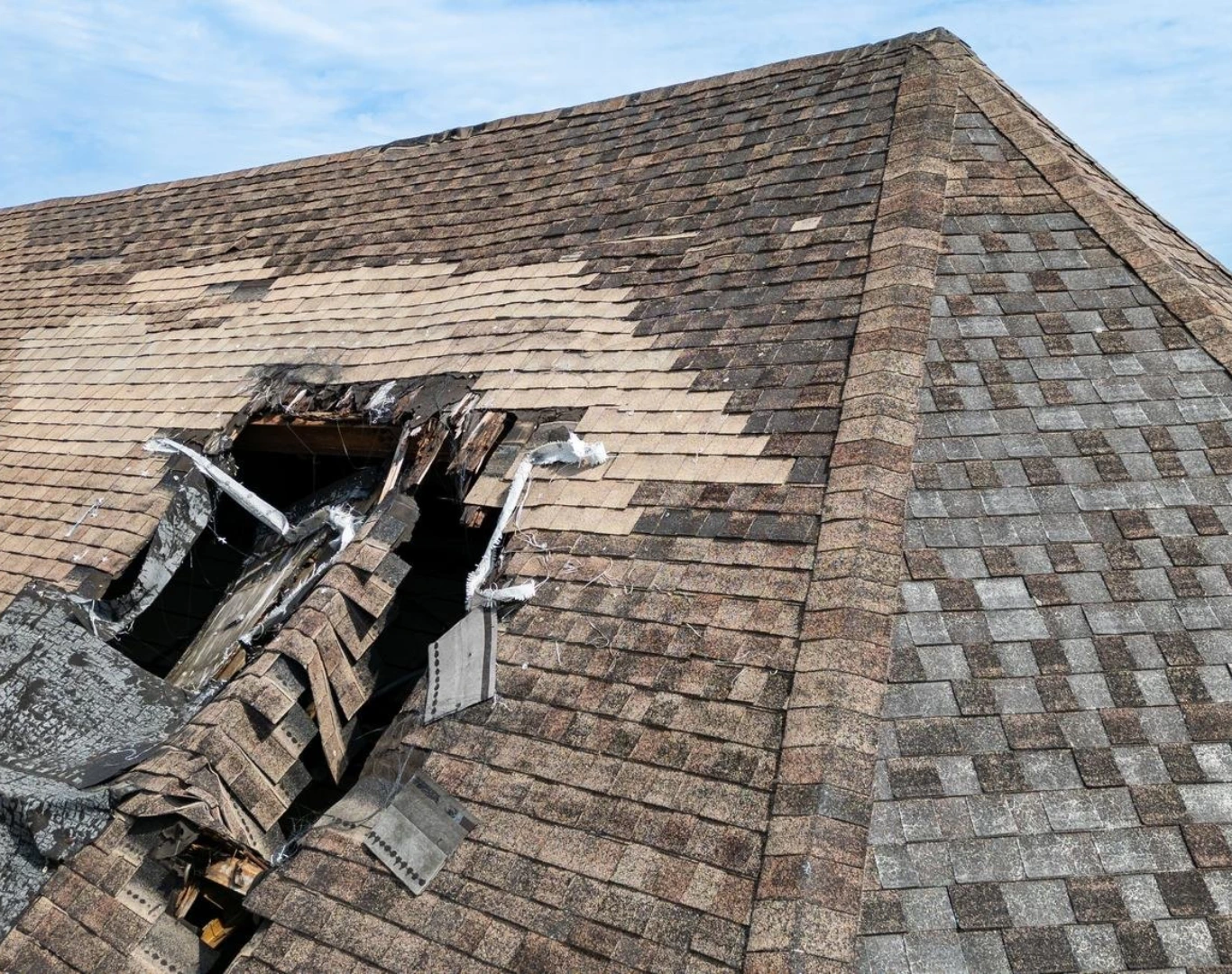 Storm-damaged shingles replaced by roof repair near me in St. Louis, MO