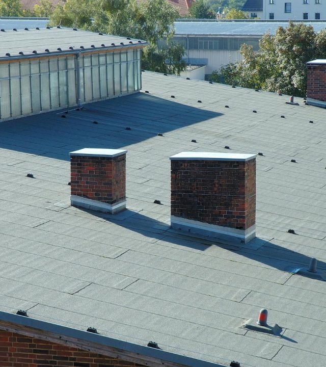 Flat roof system installed by commercial roofing in Brentwood, MO Flat roof system installed by commercial roofing in Brentwood, MO