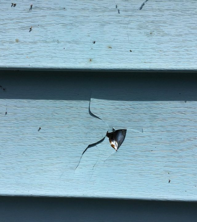 Home exterior patched by siding repair near me in St. Louis, MO