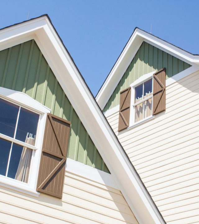 Home exterior restored by siding repair in Richmond Heights, MO by Meridian Roofing and Renovation