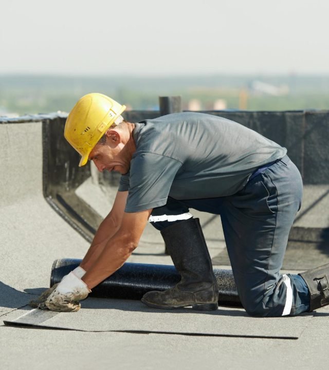 Repairs underway by commercial roofing near me in Ballwin, MO Repairs underway by commercial roofing near me in Ballwin, MO