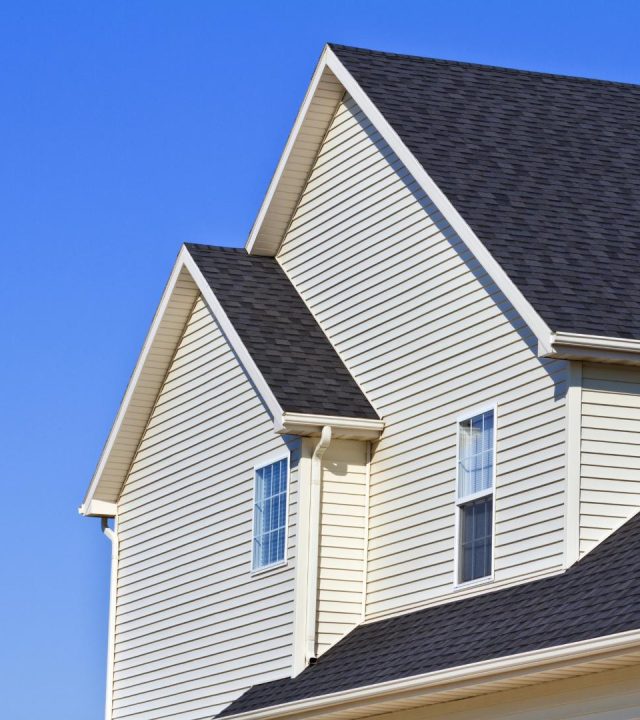 Siding repair in Creve Coeur, MO by Meridian Roofing and Renovation team in action