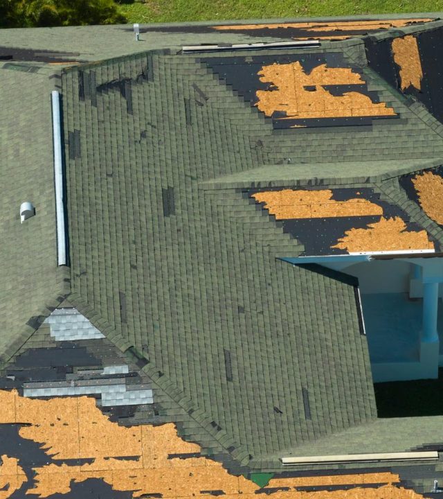 Technician completing roof inspection near me in O'Fallon, MO