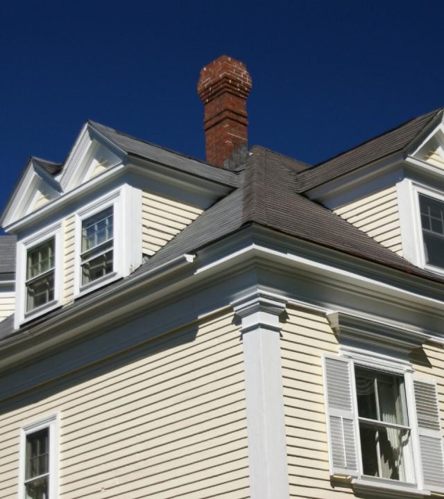 Technicians working on siding repair near me in Chesterfield, MO Technicians working on siding repair near me in Chesterfield, MO